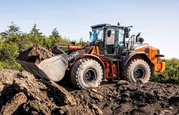 New Wheel Loader working,New Hitachi Wheel Loader lifting dirt,Side of new Hitachi Loader for Sale,New Hitachi Loader working